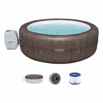 Inflatable hot tub with accessories including cover and filter.